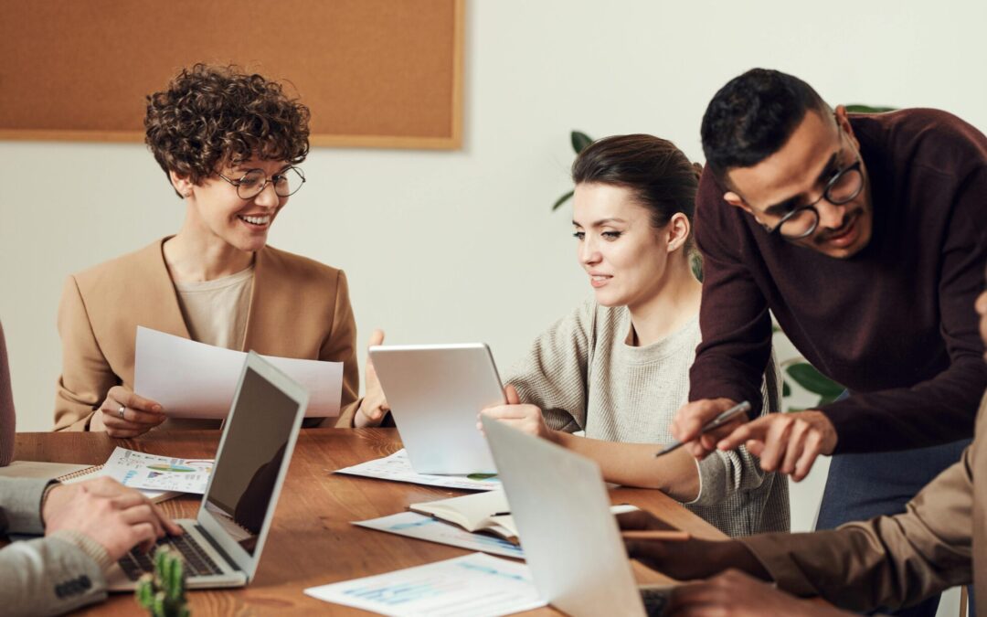 Business People Sitting in an Office Building Chatting