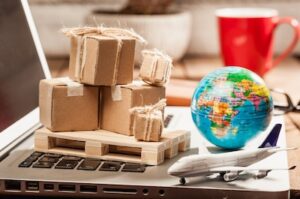 Global Shipping Business Concept on Laptop
